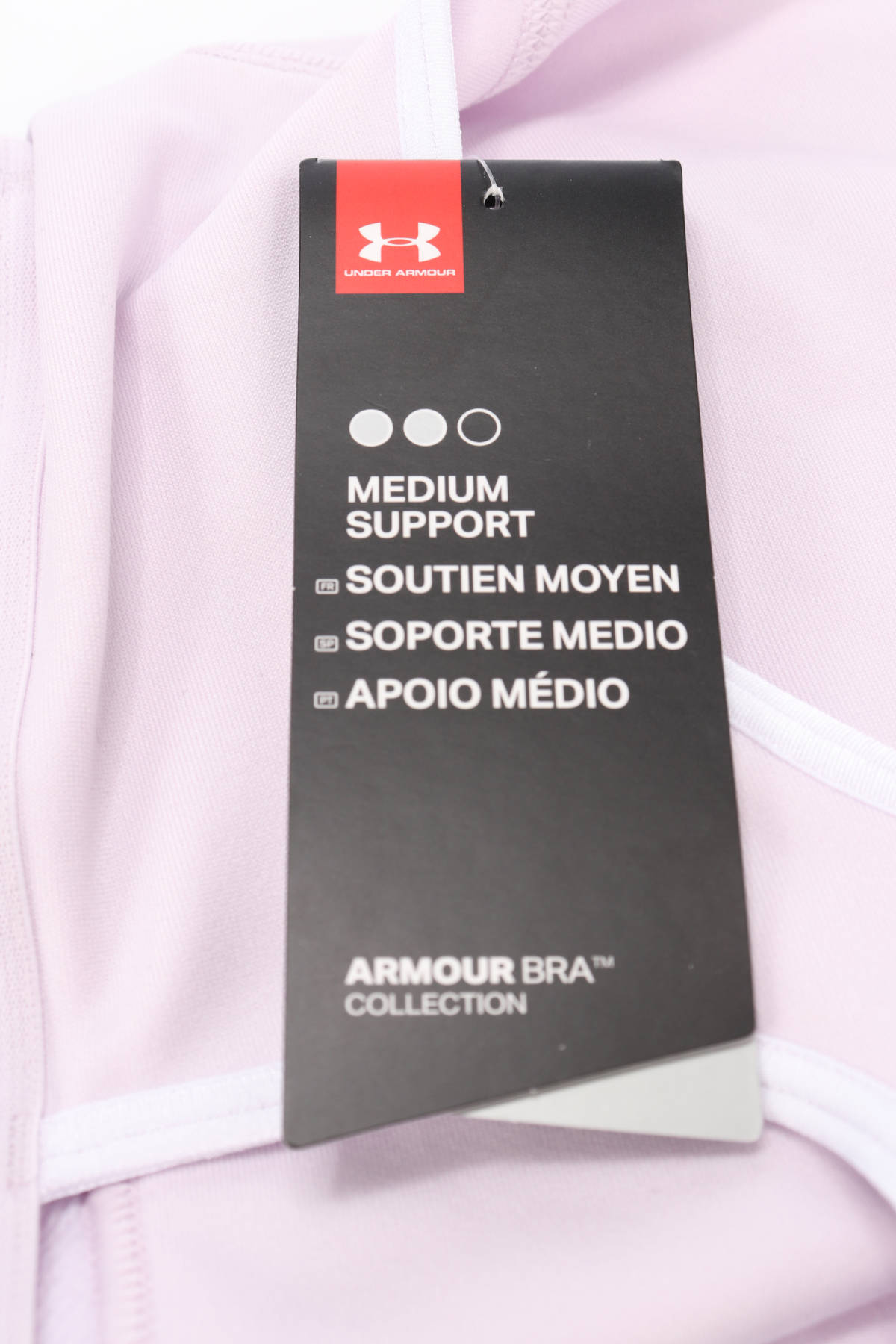 Спортно бюстие UNDER ARMOUR3 - Mania Спортно бюстие UNDER ARMOUR3