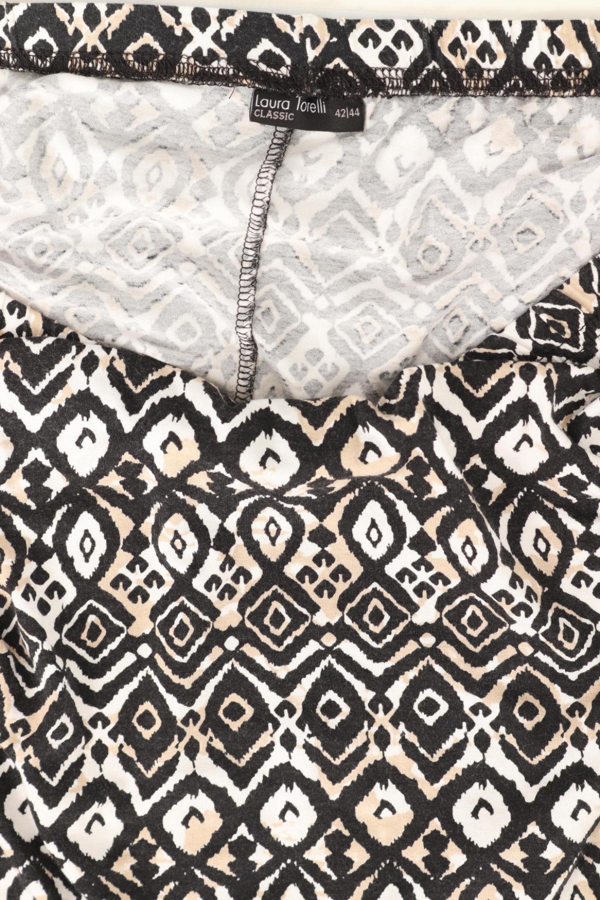 Пола LAURA TORELLI3